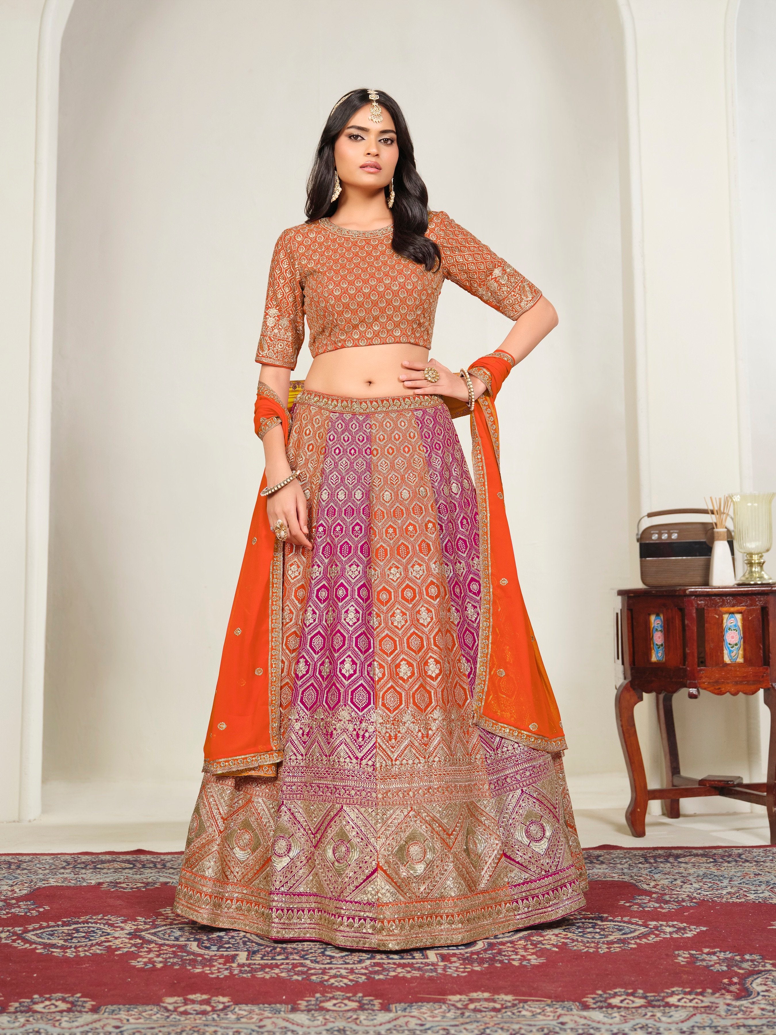 Orange Faux Georgette Sequins Lehenga