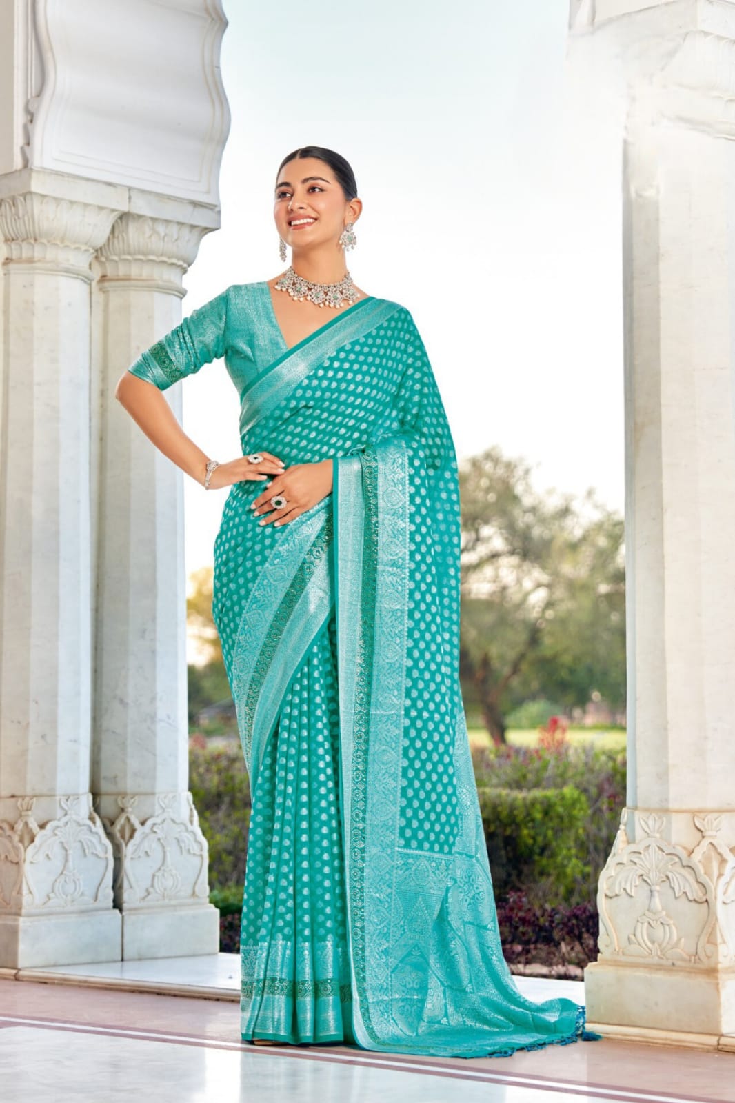 Sky Blue Twp Georgette Weaving Buta Border Pallu Saree